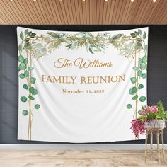 a wall hanging with a family reunion banner