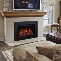 a living room with a fireplace and tv mounted on it's wall above the fire place