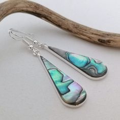 Handmade Mother Of Pearl Teardrop Earrings, Silver Teardrop Mother Of Pearl Earrings, Unique Iridescent Teardrop Earrings, Nickel-free Abalone Shell Drop Earrings, Elegant Handmade Abalone Shell Earrings, Silver Drop Earrings With Abalone Shell, Teardrop Inlay Earrings As Gift, Teardrop Inlay Earrings For Gift, Handmade Teardrop Abalone Shell Jewelry