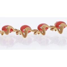 Indulge in the timeless elegance of the David Webb 18K Yellow Gold Coral And Diamond 1960's Bracelet. This exquisite piece is a true testament to the brand's commitment to craftsmanship and beauty. Crafted in 18K yellow gold, the bracelet features flexible links adorned with fluted cabochon coral, adding a touch of vibrant allure to the design. The round diamond accents gracefully enhance the piece, lending a touch of sparkle and sophistication.With its one-line design, this bracelet exudes a ca David Webb, The David, Line Design, Round Brilliant Cut Diamond, Brilliant Cut Diamond, Estate Jewelry, Round Brilliant, Round Diamond, Round Diamonds