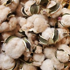 cotton floss are piled up in a pile