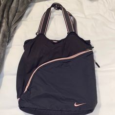 Never Used Nike Sports Bag. It Is Large In Size So A Lot Will Fit In The Bag Sporty Bag With Zipper Pocket, Functional Sports Backpack Shoulder Bag, Sports Shoulder Bag With Zipper Pocket, Sporty Shoulder Bag Backpack For Daily Use, Sporty Shoulder Bag For Everyday Use, Sporty Shoulder Bag For Daily Use, Pink Backpack Gym Bag For Daily Use, Casual Sports Bags With Removable Pouch, Gym Shoulder Bag With Zipper Pocket