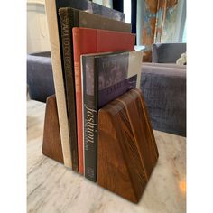 a stack of books sitting on top of a table