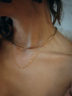 "This beautiful necklace is simple and elegant. I've formed a single piece of metal into a curved shape that sits at the collar bone. The metal is flattened in the front making the widest part of the necklace approximately 2mm. This necklace is approximately 5\" in diameter. This necklace can be great for everyday wear or for a special evening out. It's simple, clean and incredibly eye-catching. This necklace makes a great gift and comes with Premium Gift Wrap for secure shipping. Every piece is Minimalist Adjustable Chain Choker For Layering, Minimalist Clavicle Chain Choker Necklace, Minimalist Metal Choker Necklace, Elegant Metal Choker For Layering, Modern Clavicle Chain Choker For Everyday, Modern Everyday Clavicle Chain Choker, Chic Metal Choker For Everyday Wear, Sleek Simple Gold Jewelry, Minimalist Clavicle Chain Choker