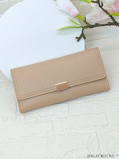 BagForLove - Apricot Fold Over Metal Decor Long Wallet - Solid and Stylish Product Description Closure Type Bifold Color Apricot Pattern Type Plain Material PU Style Elegant Features Lightweight Coating 100% Polyurethane Composition 100% Polyester Size Chart INCH CM Bag Height Bag Length Bag Width 3.5 inch 7.5 inch 0.8 inch Bag Height Bag Length Bag Width 9 cm 19 cm 2 cm Details Pictures Similar Products h2 { text-align: center; } /* æ¢è¡ */ li{ white-space: normal; word-break: break-all; word Trendy Beige Wallets With Mobile Phone Bag, Trendy Beige Wallet With Mobile Phone Bag, Versatile Beige Rectangular Wallet, Beige Pouch Clutch With Card Slots, Large Capacity Rectangular Wallets For Everyday Use, Large Capacity Everyday Wallet, Rectangular Large Capacity Everyday Wallet, Everyday Large Capacity Rectangular Wallet, Beige Pouch Wallet For Everyday