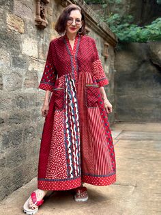 Red Kurta With Printed Motifs For Summer, Red Summer Kurta With Printed Motifs, Summer Red Kurta With Printed Motifs, Red Bohemian Kurta With Printed Motifs, Festive Cotton Maxi Dress With Printed Motifs, Festive Red Cotton Dress, Red Cotton Straight Kurta Dress, Festive Cotton Ikat Print Dress, Red Cotton Patchwork Dress