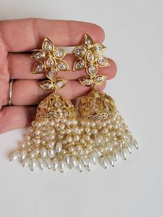 Beautiful high end quality. Light weight for comfort wear. Gold plating for lasting shine. NUST HAVE PIECE! Kundan Bridal Earrings With Pearl Drop For Wedding, Elegant Bridal Earrings For Marriage And Festivals, Elegant Bridal Earrings For Weddings And Festivals, Elegant Kundan Bridal Earrings, Elegant Kundan Bridal Earrings For Marriage, Elegant Pearl Earrings With Stone Work For Wedding, Festive Bridal Pearl Drop Earrings For Wedding, Festive Wedding Pearl Drop Bridal Earrings, Pearl Earrings With Stone Work For Wedding