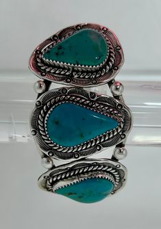 pre-owned, good condition - see photos Native American - Navajo signed "J Sterling E"  sterling & Turquoise Western Style Blue Sterling Silver Bracelet Gift, Collectible Bohemian Blue Sterling Silver Bracelet, Southwestern Blue Concho Bracelets, Blue Southwestern Style Bracelets Stamped 925, Turquoise Southwestern Cuff Bracelet Stamped 925, Southwestern Turquoise Cuff Bracelet Stamped 925, Southwestern Style Blue Sterling Silver Bracelet, Western Style Blue Sterling Silver Bracelet Collectible, Western Style Blue Sterling Silver Collectible Bracelet