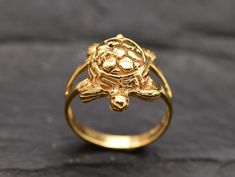 Gold Turtle Ring in a Artistic design made of Gold Vermeil ☞ thickest 18k Gold Plating on top of Solid 925 Sterling Silver ☞ made to last. Matching Set - Matching Earrings - please ask me ☞ Choose your size ☞ I resize (before shipping) for FREE to Any size* *Sizes 13-16 U.S. need to be custom made & May include an additional cost, I will contact you before starting work on those custom-made sizes with all the details. Details : ♥ Each item comes in a cute GIFT BOX ✓ ♥ GUARANTEE on the materials ✓ ♥ Pure Solid 925 Sterling Silver ☞ only Solid Pure Silver - made to last ✓ ♥ Gold Vermeil: Thickest 3 Micron Gold plate on Solid 925 Sterling Silver ✓ ♥ More Beautiful jewellery on www.etsy.com/shop/AdinaStone ☜ ✉ ✉ Shipping by Royal Mail ✉ ✉ Tracked Shipping Option - worldwide tracking - choose a Small Turtle, Turtle Ring, Turtle Jewelry, Animal Rings, Dream Jewelry, Boutique Jewelry, Antique Rings, 925 Sterling Silver Jewelry, Pure Silver