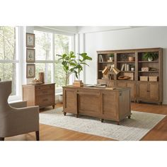 a living room scene with focus on the desk and bookcase in the background,