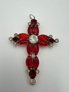 Vintage Juliana red navette cabochon cross pendant  In good condition, bale has been replaced  Measures 3" x 2.25" 2024 Red Vintage Jewelry With Cabochon, Vintage Red Cross Jewelry, Bohemian Red Beads, Gems, And Cabochons, Cross Pendant, Jewelry Necklace Pendant, Jewelry Necklaces, Pendant Necklace, Pendant, Red