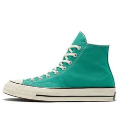 The Converse Chuck 70 High 'Court Green' is a modern take on the classic 1970s design. Featuring a sharp toe and two-tone stitching, the sneaker is a stylish addition to any wardrobe. The rubber sole provides a comfortable fit and the green colorway adds a subtle level of sophistication. Perfect for everyday wear, the Chuck 70 High is inspired by the original 1970s design and is sure to make a statement. Whether you're running errands or out for a night on the town, the Chuck 70 High is the perfect choice. (SNKR/Cozy/Light/Unisex/High Top) Converse Retro Sneakers With Contrast Sole, Retro Converse Sneakers With Contrast Sole, Retro Converse Canvas Shoes With Rubber Toe Cap, Low-top Sneakers With Contrast Stitching For Streetwear, Lace-up Sneakers With Contrast Stitching For Streetwear, Green High-top Canvas Shoes With Gum Sole, Retro Green High-top Sneakers With Vulcanized Sole, Retro Green High-top Sneakers, Retro Converse Low-top Canvas Shoes