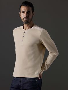 Front 3/4 body view of man wearing Milford Waffle Henley in Bone white from AETHER Apparel. Life Of Adventure, Waffle Henley, Men's Knit, Fall Collection, Poplin Fabric, Winter Collection, Card Sizes, Peru, Knit Top