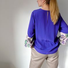 Digital Sewing Pattern for beginners for Women's Relaxed fit blouse with contrast voluminous/loose-flowing style sleeves, with elasticated ends tightly at the wrist. Relaxed Fit Blouse With Pleated Balloon Sleeves, Blue Blouse With Balloon Sleeves For Work, Long Sleeve Viscose Blouse With Gathered Sleeves, Stretch Long Sleeve Blouse With Gathered Sleeves, Long Sleeve Stretch Blouse With Gathered Sleeves, Stretch Blouson Sleeves Blouse For Work, Stretch Blouson Sleeve Workwear Blouse, Long Sleeve Blouse With Gathered Sleeves, Stretch Blouse With Blouson Sleeves For Work