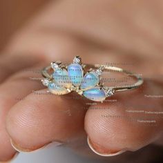 14K Gold Pear Opal Ring, Dainty Wedding Gemstone Band Ring, Stacking Engagement Ring, Gemstone Ring For Her, Diamond Ring, Pear Tiara Ring, Gemstone Band RingProduct info:14k solid goldnatural diamond - white diamondwhite diamonds, I color, SI claritywhite diamonds - 0.05 ct, I, SI clarityOpal :0.65 ct, NaturalRing Size 7Item will be resized and shipped within 10 days.ITEM Will BE SHIPPED : India Speed PostTo get the item in 4-5 days, we can also ship it thru DHL express, please contact us befor White Diamond Wedding Rings Stamped 14k, Wedding 14k Gold Birthstone Ring With Diamond Accents, Wedding Birthstone Ring With Diamond Accents In 14k Gold, 14k Gold Birthstone Ring With Diamond Accents For Wedding, 14k Stamped Birthstone Ring For Wedding, Wedding Birthstone Ring In Diamond White 14k Gold, Diamond White 14k Gold Wedding Birthstone Ring, 14k Gold Birthstone Ring In Diamond White For Wedding, Diamond White Cluster Jewelry For Wedding