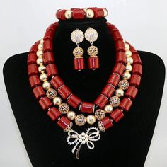 Elevate your Nigerian wedding or party look with this Bead Jewelry. Handcrafted with care, these jewelry pieces add a touch of color and cultural significance to your ensemble, making you stand out with traditional elegance. Traditional Decorative Wedding Jewelry, Festive Wedding Jewelry With Decorative Details, Festive Wedding Jewelry, Festive Decorative Wedding Jewelry, Festive Polished Round Bead Jewelry Sets, Traditional Beaded Jewelry For Ceremonies, Elegant Red Beaded Jewelry Set, Traditional Colorful Beads Jewelry For Celebration, Traditional Round Beads Jewelry For Ceremonies