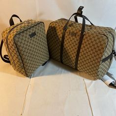 Beautiful Duffle Travel Bag And Square Book-Bag By Gucci. Crafted In Beige Monogram Canvas. Duffle Bad Still Has Original Wrapping And Book-Bag Has Original Packaging On The Inside. Never Worn! Brand New! Please Check The Photos Carefully And Ask If You Need To Know More Details Or If You Have Any Questions Please Feel Free To Contact Me. Receipt Can Be Shown As Well. Designer Duffle Bag For Shopping, Gucci Rectangular Bag For Everyday Use, Gucci Travel Satchel Bag, Gucci Rectangular Everyday Bag, Designer Rectangular Travel Bag For Shopping, Designer Rectangular Travel Bag, Luxury Duffle Bag For Shopping, Designer Travel Bag With Leather Handles For Shopping, Designer Duffle Bag For Everyday Use