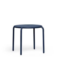 a small blue table sitting on top of a white floor