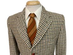 "Vintage 1960s/70s Harris Tweed Heavy Wool Sport Coat MAKER: Dunn & Co. COLOR: a beautiful earthy plaid in contrasting greens, browns and cream MATERIAL: Handmade tweed from pure Scottish wool - soft, thick and heavy STYLINGS: 3-button front, topstitching, fully canvassed, medium shoulder padding, flapped inset pockets, fully lined, single back vent CONDITION: excellent - no holes, rip, stains or odors  SIZE: not tagged - estimated sz 40 Short - please refer to measurements: armpit to armpit: 21 Mens Sport Coat, Harris Tweed, Plaid Blazer, Vintage 60s, Vintage 1960s, Sport Coat, Blazer Jacket, 3 D, Display Homes