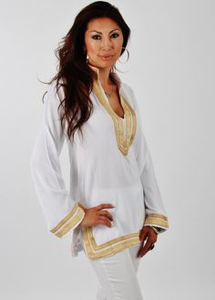 ooooooooooooº© Handmade White Tunic- Mariam Style This is a vintage Moroccan Tunic Shirt, ideal for any casual wear. With a unique embroidery pattern and Moroccan buttons, this tunic shirt will surely be a wonderful one off item! Wear it with caual jeans, or black trousers and you will be sure to create a bohemian chic impact to everyone. Enjoy the Winter Look with our beautiful tunics. We have sizes: S/M/ /L/XL ♥ ♥Maison Marrakech Size Chart (all sizes in inches) ♥ ♥ ♥ ♥ Sizing Guide Small Medi Long Sleeve Blouse For Beach Cover-up, Beachwear Long Sleeve Blouse For Beach Cover-up, Long Sleeve Beachwear Blouse For Beach Cover-up, Beachwear Long Sleeve Blouse Cover-up, Summer Beachwear Tunic Top, Vacation Tunic Cover-up, Beachwear Long Sleeve Tops For Vacation, White V-neck Tops For Poolside, White Long Sleeve Poolside Cover-up