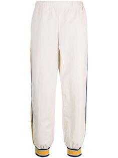 light beige/lemon yellow/navy blue cotton blend striped edge elasticated waistband two side inset pockets two rear patch pockets elasticated ankles tapered leg Nylon Track Pants, Training Pants, Leather Cap, Athletic Outfits, Lemon Yellow, Denim Pant, Modern Fashion, Light Beige, Womens Shoes Sneakers