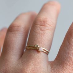 This Initial ring is a beautiful piece to add to your stacking set. It is made with a skinny but sturdy band and a hammered piece of gold on which I stamped the initial. The hammered ring surface also makes this ring even more shiny and beautiful. The ring is 0,8-0,9 mm thick and looks very dainty on the finger. It's made of solid 9K gold. If you want it to be 14K, contact me for the price quote. Customization I can use lower case or upper case letters. Just let me know the details in the messag Upper Case Letters, Moissanite Engagement Ring White Gold, Chalcedony Crystal, March Birthstone Ring, Hammered Silver Ring, Floral Engagement Ring, Sterling Silver Stacking Rings, Gold Rings Stackable, Hammered Ring