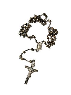 Sterling Silver Rosary  An old example that looks to have never been cleaned and which is signed "Sterling" twice and with a faint stamping of the maker's mark on the cross.  It's difficult to make out yet looks like two letters "SF" or "SP".  The cross is quite detailed.  I tried to capture that in the images and the figurative Jesus is full formed; a casting unto itself and then attached.  I can appreciate cleaning this rosary but if hand held, it'll receive a wonderful worn patina into the da Vintage Cross Jewelry With 8mm Beads, Vintage Cross Necklaces With 8mm Beads, Vintage Cross Necklace With 8mm Beads, Vintage Silver Rosary With Round Beads, God Oc, Cross Aesthetic, Cross Rosary, Oc Board, Sneaker Posters