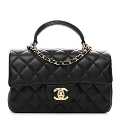 This is an authentic CHANEL Lambskin Quilted Mini Top Handle Rectangular Flap in Black. This chic mini cross body classic is crafted of quiltedlambskin leather in black. The bag features a leather top handle, a gold chain link leather threaded shoulder strap and a facing gold Classic CC turn lock. This opens the flap to a black leather interior with pockets. Chanel Mini Top Handle, Chanel Mini Rectangular, Chanel Top, Chanel Mini, Mini Cross, Mini Top, Leather Thread, Leather Interior, Lambskin Leather