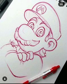 a drawing of a super mario bros character with red marker on it's paper