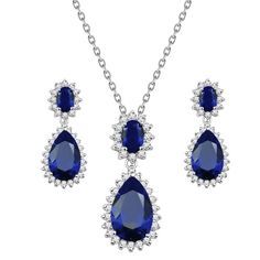 - Necklace is 16" + 3" length,pendant and earrings are the same size : 1.18" x 1.18" - Rhodium Plated to enhance shine and durability - Cubic Zirconia stones are set the pendant and earrings for ultimate sparkle - Comes with a free luxury gift box Elegant Pear-shaped Blue Jewelry, Elegant Blue Pear-shaped Jewelry, Teardrop Sapphire Cubic Zirconia Jewelry, Teardrop Sapphire-colored Cubic Zirconia Jewelry, Blue Cubic Zirconia Teardrop Jewelry Sets, Blue Teardrop Cubic Zirconia Jewelry Sets, Blue Teardrop Jewelry For Formal Occasions, Blue Teardrop Pendant Jewelry For Formal Occasions, Blue Teardrop Jewelry Sets For Formal Occasions