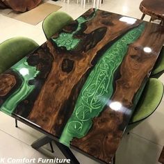 the table is made out of wood and has green paint on it's surface