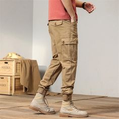 Applicable Season: Spring and Autumn tyle: Cargo Pants Style: Safari Style Thickness: Midweight Waist Type: MID Decoration: NONE Gender: MEN Item Type: Full Length Closure Type: Elastic Waist Fabric Type: Broadcloth Length: Full Length Front Style: Flat Fit Type: Regular Cargo Pants Style, Safari Style, Pants Style, Pencil Pants, Cargo Pants Men, Pants Men, Cotton Pants, Spring And Autumn, Fashion Pants