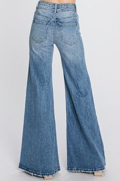 - 11" Rise, 34" Inseam, Modeled in size 3/25 - Leg opening : 29" - High-rise, Vintage wide leg jeans - Double button detail - Button closure and zip fly - 5-pocket styling 90s Cowgirl, Pass The Vibe Check, Vintage Wide Leg Jeans, 70s Inspired Outfits, 70s Jeans, Cowgirl Vintage, Wide Leg Denim Jeans, Core Wardrobe, Jeans For Girls