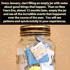 a jar filled with lots of notes on top of a table