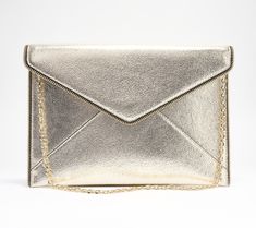 Effortlessly elegant, this chic clutch boasts six credit card slots to keep your expertly organized (without a bulky wallet to tote around). Plus, the chain shoulder strap provides a hand-free option. From Rebecca Minkoff. Formal Envelope Bag With Chain Strap, Elegant Envelope Bag With Chain Strap, Chic Formal Wallet On Chain With Removable Pouch, Chic Envelope Clutch With Chain Strap, Chic Shoulder Clutch With Card Slots, Chic Clutch Shoulder Bag With Card Slots, Chic Clutch With Card Slots, Chic Clutch With Chain For Gift, Chic Clutch With Chain Detail