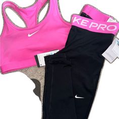 Pink Athleisure Sets For Gym, Pink Fitted Workout Sets, Pink Fitted Sports Sets, Fitted Pink Nike Activewear, Pink Fitted Workout Set, Fitted Pink Workout Set, Pink Sporty Gym Sets, Nike Fitted Sports Sets, Nike Fitted Sportswear Sets