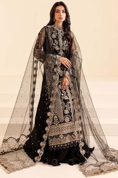 Elegant Embellished Black Pakistani Wedding Dress in Pishwas Style Black Organza Sharara For Reception, Semi-stitched Organza Wedding Dress For Eid, Pakistani Wedding Outfits Black, Black Dress Pakistani Style Wedding, Semi-stitched Elegant Wedding Dress For Designer Wear, Elegant Semi-stitched Wedding Dress, Anarkali Embellished Organza Wedding Dress, Black Gown With Sheer Dupatta For Designer Wear, Eid Wedding Dress With Sheer Dupatta In Organza