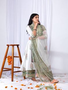 This suit set comes with a double dori neck detailing and a front long panel with borders. Pair it with a matching palazzo and hand-block printed dupatta for a complete elegant look this summer. 100% Premium Cotton Printed Suit Set Hand-block Printed Dupatta Comfort fit Set Contents: 1 Kurta, 1 Dupatta, 1 Palazzo Model height is 5.7 feet and is wearing size M Wash Care Instructions: Dry Clean Only Note: The product will be delivered within 15-20 days of the order placed. The product can be made Antique Gold Earrings, Printed Suit, Printed Dupatta, Printed Kurti, India Fashion, Kurta Set, Suit Set, Pin Tucks, Best Deal