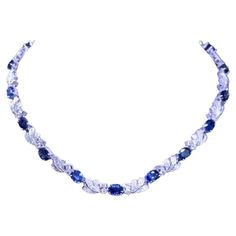 An exclusive contemporary design, so glamour enchanting, refined details, from Italian designer. Necklace come in 18k gold with 17 pieces of natural Ceylon sapphires, oval cut, fine quality, 25.68 carats, and 144 pieces of natural diamonds in round brilliant cut, 5,11 carats, F color VS clarity. It is a very piece of art and high jewelry. An expression of Italian beauty and craftsmanship. Handcrafted by artisan goldsmith. Excellent manufacture and quality. Complete with AIG certificate. Whosale price. Note: on my shipment, customers not pay taxes. 18k Gold Necklace, Italian Beauty, Ceylon Sapphire, Designer Necklace, Italian Designer, Multi Strand Necklace, Sapphire Diamond, High Jewelry, Multi Strand