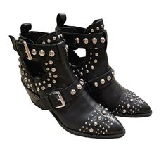 Gently Used, Worn Twice Beautiful Black Leather Metal Studded Booties With Side Buckle. These Look Fabulous With Any Outfit, From Denim To Dress Attire. Sure To Fetch Many Compliments. Studded Boots With Flat Heel For Fall, Punk Heels With Reinforced Heel For Fall, Spring Punk Leather Moto Boots, Punk Style Leather Moto Boots For Spring, Fall Moto Boots With Rivets And Pointed Toe, Leather Boots With Spikes For Fall, Edgy Spring Heeled Boots With Buckle Closure, Studded Leather Moto Boots With Pointed Toe, Studded Ankle Moto Boots For Fall