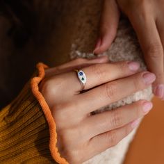 Mark your moments in style with the Mixed Birthstone Signet Ring, adding a touch of personal and timeless elegance to your everyday look. No matter the birthstones you choose, this statement ring is one to keep. Material: High Quality Solid 925 Sterling Silver Finish: Sterling Silver ∙ 18K Gold ∙ Rose Gold Featuring a bold Signet Ring with ~2mm and ~3mm Round CZ Gemstones on a ~1.5mm Band Part of our Birthstone Collection Model showcases a statement ring stack featuring our Reese Link Ring, Ann Initial Tag Necklace, Sideways Initial Necklace, Dainty Initial Necklace, Link Ring, Diamond Huggies, Art Deco Diamond Rings, Ring Stack, Linking Rings, Round Rings