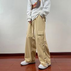 Threebooy Wide Leg Hip Hop Pants Button Decor Men Casual Cotton Harem Cargo Loose Baggy Trousers Streetwear Joggers Clothing Material: COTTON Applicable Scene: CASUAL Pant Style: Cargo Pants Style: Japan Style Model Number: MEN Thickness: midweight Waist Type: MID Casual Cotton Cargo Pants With Buttons, Casual Straight Leg Cargo Pants With Buttons, Casual Full Length Pants With Buttons, Casual Full Length Buttoned Pants, Casual Full Length Bottoms With Buttons, Casual Khaki Cargo Pants With Button Closure, Casual Bottoms With Buttons For Streetwear, Casual Streetwear Pants With Button Closure, Utility Style Khaki Bottoms With Buttons