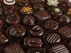 a bunch of chocolates that are sitting on a table