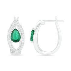 Enhance your style with these elegant hoop earrings. Fashioned in sterling silver, each earring showcases a 7.0 x 5.0mm pear-shaped lab-created verdant-green emerald positioned at the base of a marquise-shaped orbit-style hoop lined with lab-created shimmering white sapphires. Buffed to a brilliant luster, these earrings secure with latch backs. Verdant Green, Lab Created Emerald, Peoples Jewellers, Green Emerald, White Sapphire, Pear Shaped, Emerald Green, Sterling Silver Earrings, Pear