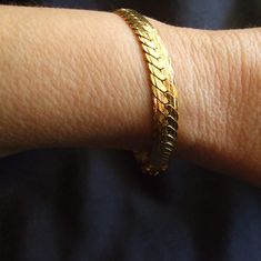 Vintage Napier bracelet has braided style gold chain. This is in excellent condition. No damage and the only wear I see is on the inside by the clasp. Of course this doesnt show when worn. See last pic.  It is about 7.25 inches when opened from end to end. This is marked on the clasp. More vintage Napier here:  https://www.etsy.com/shop/badkittyvintagefinds?ref=seller-platform-mcnav&search_query=napier More vintage bracelets here:  https://www.etsy.com/shop/badkittyvintagefinds?ref=seller-platform-mcnav&search_query=bracelet More vintage Jewelry In my Store: https://www.etsy.com/shop/badkittyvintagefinds?section_id=14398871&ref=shopsection_leftnav_7