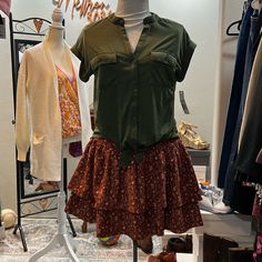 This Adorable Skirt Features Two Layers Of Tiered, Corduroy Floral, And Elastic Smocking In The Back For A Great Flexible Fit Casual Stretch Tiered Mini Skirt, Casual Cotton Skirt For Fall, Casual Green Skirt For Fall, Casual Green Fall Skirt, Cotton Tiered Skirt For Fall, Casual Stretch Mini Skirt For Fall, Casual Green Pleated Skirt, Cotton Stretch Mini Skirt For Fall, Cotton Mini Skirt For Fall Day Out