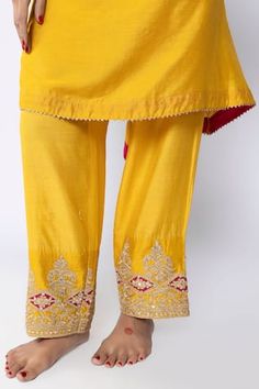 Mustard kurta with zari thread, sequin placement embroidery in floral pattern. Paired with inner and pant. - Aza Fashions Traditional Straight Pants Sharara For Festive Occasions, Festive Embroidered Traditional Wear With Straight Pants, Festive Embroidered Traditional Straight Pants, Festive Traditional Embroidered Straight Pants, Festive Embroidered Straight Pants, Diwali Straight Pants Palazzo Set With Zari Work, Embroidered Straight Palazzo Set For Festive Occasions, Traditional Designer Pants With Gota Work, Diwali Palazzo Set With Zari Work In Straight Pants