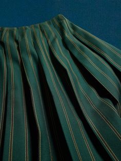 Crafted in a beautiful Italian wool, this pleated wool skirt brings the timeless tailoring of traditional tartan styles, with a leather strap closure at the side and mixed patterns for added edge that begs for a layered approach.  RELAXED FIT: Cut wi Elegant School Pleated Skirt With Lining, Classic Green Pleated Skirt, Mixed Patterns, Wool Skirt, Wool Skirts, Pattern Mixing, Tartan, Banana Republic, Leather Straps