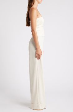 Rock a sophisticated day-to-night vibe in this sleek strapless jumpsuit punctuated with cuffed wide hems. Strapless 89% polyester, 8% linen, 3% elastane Dry clean Imported Stretch Strapless Wide Leg Jumpsuit, Elegant High-waisted Stretch Strapless Jumpsuit, Chic Off-shoulder Stretch Strapless Jumpsuit, Casual Strapless Wide-leg Jumpsuit With Stretch, Chic White Strapless Wide-leg Jumpsuit, Strapless Jumpsuit, Favorite Daughter, Maternity Shops, Designer Clothes For Men