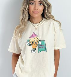 Ice cream shirt, Sunday Fun Day Shirt, Ice Cream Gift, Ice Cream Gifts, Ice Cream kids shirt, 60s Fashion, 60s t shirt, retro 60s shirt, cartoon character, retro graphic tshirts, retro shirt women, retro shirt men, retro graphic, aesthetic shirt, Vintage Graphic tee, character tee, teen food shirt, Funny food shirt,  Sundae Fun Day is a classic Retro Comfort Colors tshirt. It's for ice cream lovers big and small, and is fashionable for all different types of outfits.  This durable t-shirt feels Retro Short Sleeve T-shirt With Graphic Print, Trendy Cotton T-shirt With Retro Print, Casual Relaxed Fit T-shirt With Retro Print, Retro White T-shirt With Funny Print, Summer Graphic Tee With Character Print, Retro Graphic Print T-shirt For Spring, Fun Crew Neck Shirt With Screen Print, Retro Graphic Print Crew Neck Top, Retro Crew Neck Top With Graphic Print